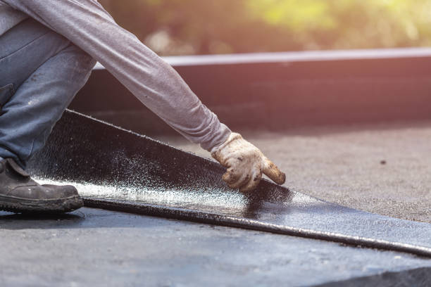 Professional Waterproofing technician working in Howard, WI